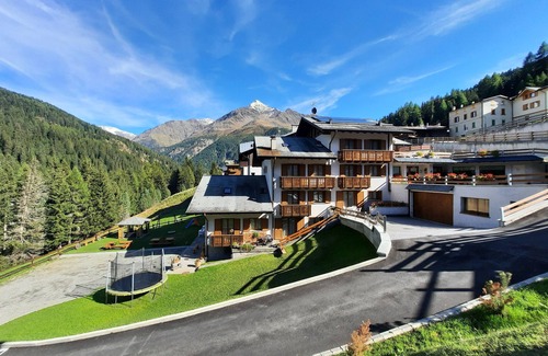 Santa Caterina Valfurva Apartamento | Apartamento 'Chalet Primula 13' con vistas a la montaña, jardín compartido y Wi-Fi