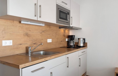 Immenstaad am Bodensee Apartamento | Apartamento 'A1 1 Obergeschoss Nummer 12' con terraza compartida, jardín compartido y Wi-Fi