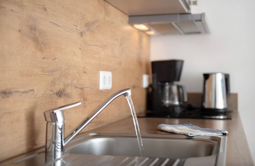 Immenstaad am Bodensee Apartamento | Apartamento 'A1 1 Obergeschoss Nummer 12' con terraza compartida, jardín compartido y Wi-Fi