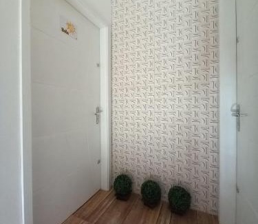 Passo de Torres Apartamento | Apartment 2 blocks from the sea with parking and Wi-Fi