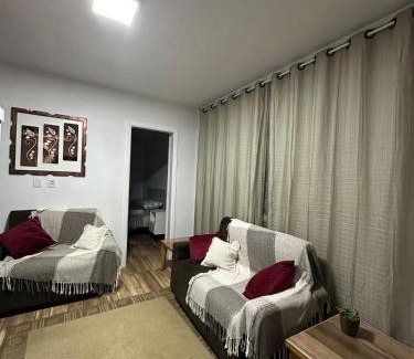 Passo de Torres Apartamento | Apartment 2 blocks from the sea with parking and Wi-Fi