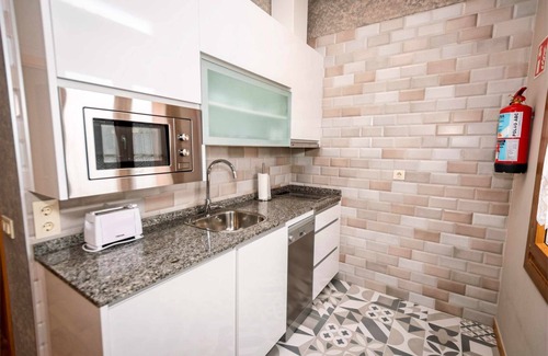 Serantes Apartamento | Apartamento 9: Diseño moderno con vistas a jardín