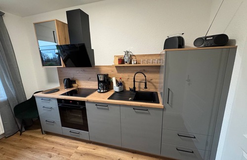 Edewecht Apartamento | Apartamento 'Ahlers' con terraza compartida, jardín privado y Wi-Fi