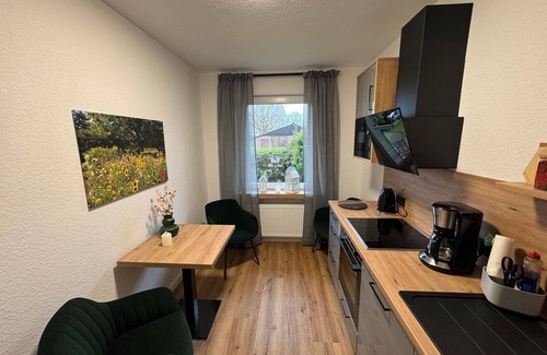 Edewecht Apartamento | Apartamento 'Ahlers' con terraza compartida, jardín privado y Wi-Fi