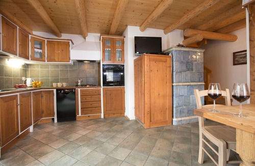 Bellamonte Apartamento | Apartment 'Appartamento Tabià In Baita Lor' with Mountain View, Shared Garden and Wi-Fi