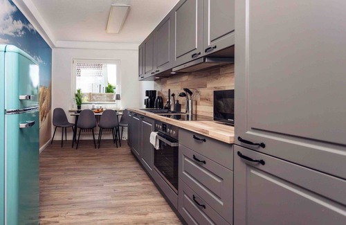 Busumer Deichhausen Apartamento | Apartamento 'Büsumer Butze' con jardín privado y Wi-Fi