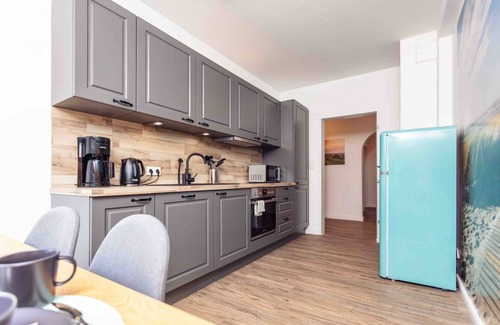 Busumer Deichhausen Apartamento | Apartamento 'Büsumer Butze' con jardín privado y Wi-Fi