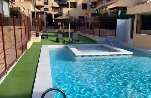 Los Geraeos Apartamento | Apartamento 'Brisa Del Mar' con piscina compartida, Wi-Fi y aire acondicionado