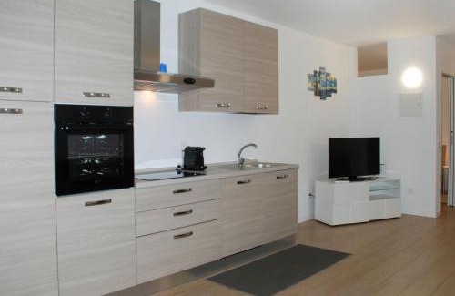 Bissone Apartamento | Apartment Charming Gardenview App- 102 by Interhome