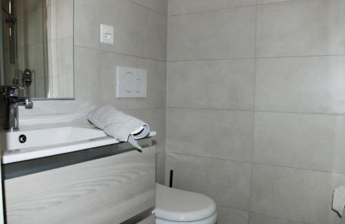 Bissone Apartamento | Apartment Charming Gardenview App- 102 by Interhome
