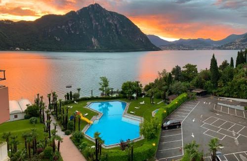 Bissone Apartamento | Apartment Charming Gardenview App- 102 by Interhome