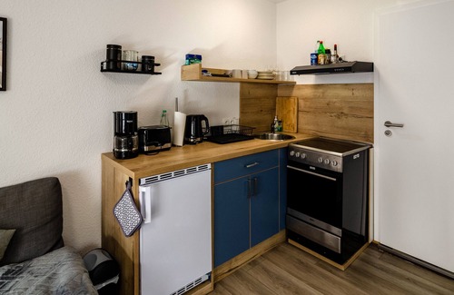 Detern Apartamento | Apartamento 'Ferienwohnung Didi' con terraza compartida, jardín compartido y Wi-Fi