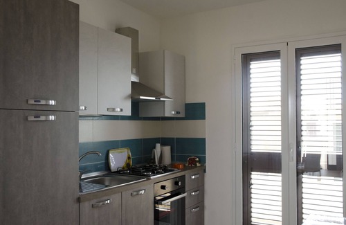 Fondo Morte Apartamento | Apartamento 'Dolce Vita Marzamemi Uno' con vistas al mar, terraza compartida y aire acondicionado.