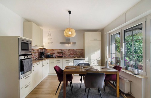 Norden Apartamento | Apartamento 'Ferienhaus Sonnenschein - Wohnung 2' con terraza privada, jardín privado y Wi-Fi
