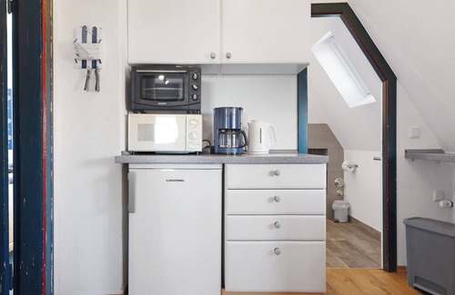 Suederhafen Apartamento | Apartamento 'Ferienwohnung Deichblick' con jardín compartido, balcón y Wi-Fi