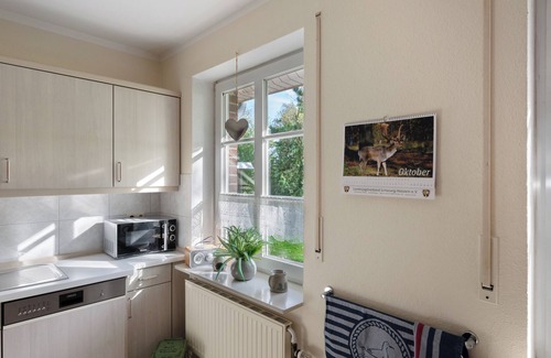 Nordstrand Apartamento | Apartamento 'Ferienwohnung Schimmelreiter' con terraza privada y jardín compartido