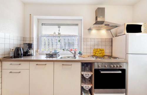 Herscheid Apartamento | Apartamento 'Ferienwohnung Am Wald' con terraza privada, jardín compartido y Wi-Fi