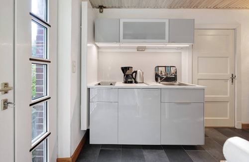 Pellworm Apartamento | Apartamento 'Ferienwohnung Gartenfreude' con terraza privada, jardín privado y Wi-Fi