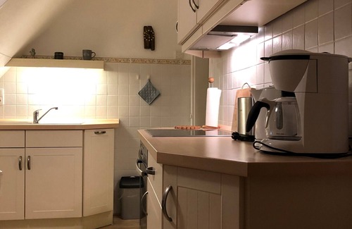 Langeneß Apartamento | Apartamento 'Fewo- Nommensen' con jardín compartido y Wi-Fi