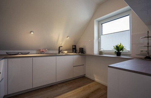 Stinteck Apartamento | Apartment Gezeiten with beautiful balcony and bicycle shed