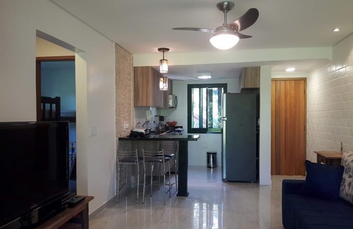 Barra do Una Condominio | Fit / chalet condominio caminar en la arena en una barra
