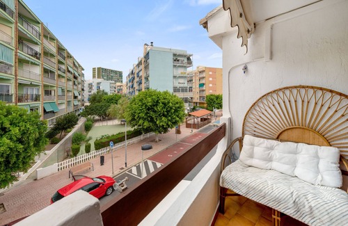 Playa Pobla de Farnals Apartamento | Apartamento 'Isa Beach ' con piscina compartida, Wi-Fi y aire acondicionado