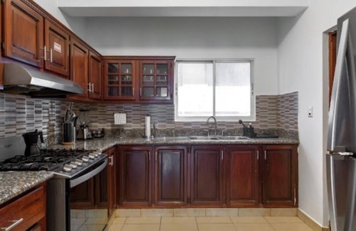 Downtown Santo Domingo Apartamento | Apartment in Piantini Sleeps 12