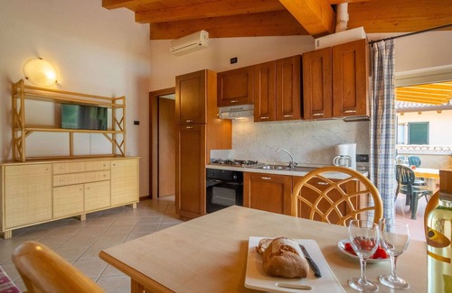 Cunettone Casa | Apartamento en Salò con Piscina y Olivos