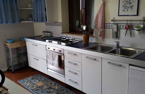 Torgiano Apartamento | Una espléndida vista de Asís y el valle de Umbría.