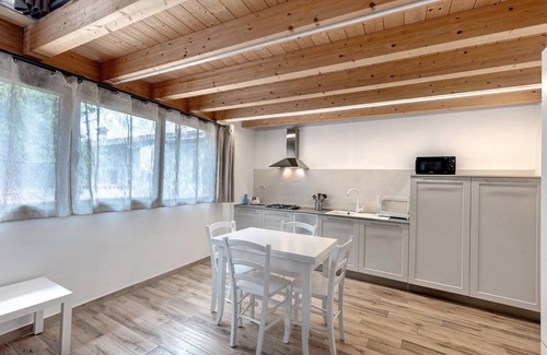 Portese Apartamento | Apartamento 'Soppalco - Isola Trimelone' con piscina compartida, Wi-Fi y aire acondicionado