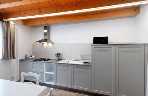 Portese Apartamento | Apartamento 'Soppalco - Isola Trimelone' con piscina compartida, Wi-Fi y aire acondicionado