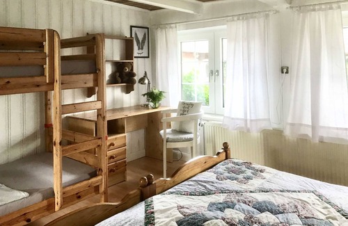 Dorphof Apartamento | Apartment Large Reetdachkate - Reetdachkaten in Schuby, Baltic Sea