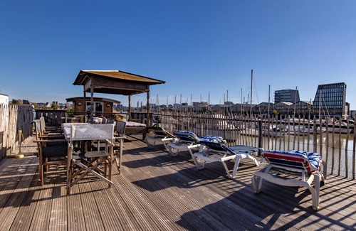 Bassins a Flot Apartamento | Apartamento 'Le Carre Du Marinier' con vistas al lago, terraza compartida y Wi-Fi
