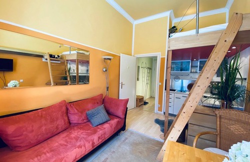 Hohenaschau im Chiemgau Apartamento | Apartment living room and bedroom with bunk bed, 20 sqm, App. 102