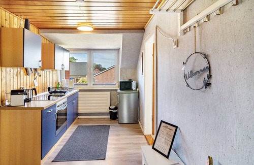 Detern Apartamento | Apartamento 'Ferienwohnung Lotte' con terraza compartida, jardín compartido y Wi-Fi
