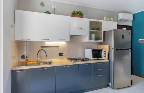 Lugana Apartamento | Apartamento 'Lugana Garten Heim' con jardín privado, Wi-Fi y aire acondicionado
