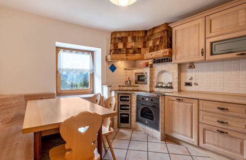 San Giovanni di Fassa Apartamento | Apartamento 'Muncion Apparte' con vistas a la montaña y jardín compartido