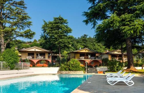 Villaggio Sanghen Casa | Apartment on Lake Garda with pebble beach pier for boat three swimming pools