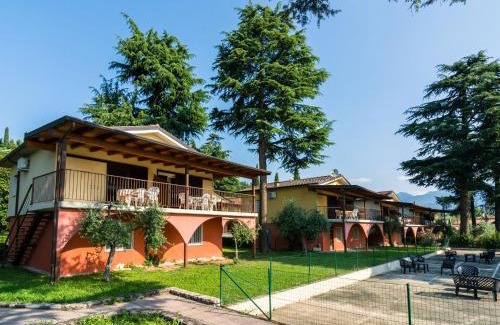 Villaggio Sanghen Casa | Apartment on Lake Garda with pebble beach pier for boat three swimming pools