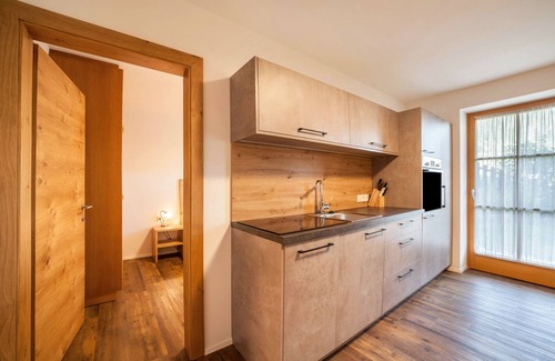Racines Apartamento | Apartamento "Parigger Apt Enzian" con vistas a la montaña, jardín compartido y Wi-Fi