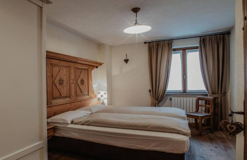 Valdidentro Apartamento | Apartamento 'Rustico Pradella Apartments' con vistas a la montaña, terraza compartida y Wi-Fi