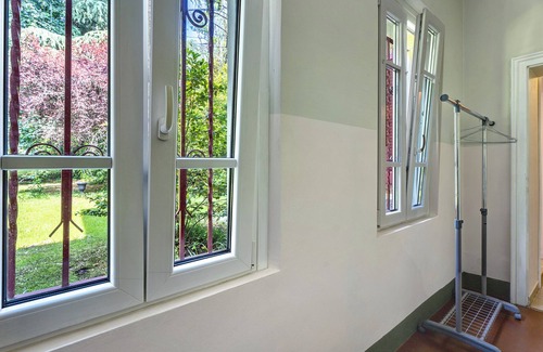 Capolago Apartamento | Apartamento 'Suite Con Camino E Terrazza' con terraza privada, jardín compartido y Wi-Fi
