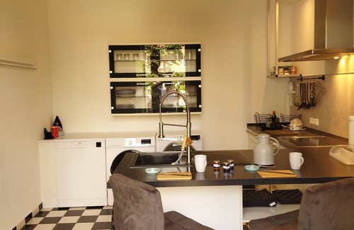 Bad Salzuflen Apartamento | Apartment with fireplace, terrace and beach area