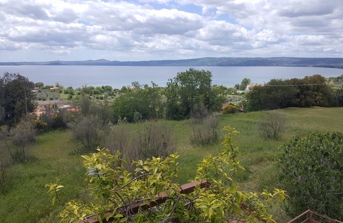 Bolsena Apartamento | Apartamento con jardín 4 personas con vista al lago hermoso y cómodo estacionamiento