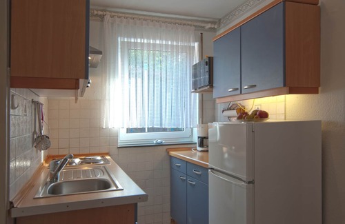 Enkirch Apartamento | Apartamento con gran terraza en el jardín soleado y vistas al Mosela