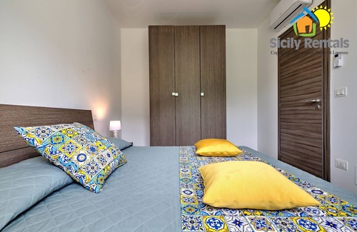 Capaci Casa | Apartment with swimming pool and near the beach