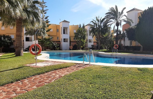 Playa de Vera Apartamento | APARTAMENTO CON PISCINA RESIDENCIA NATURISTA PLANTA BAJA