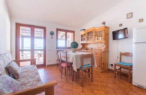 Putzu Idu Apartamento | Apartamento con terraza en el mar