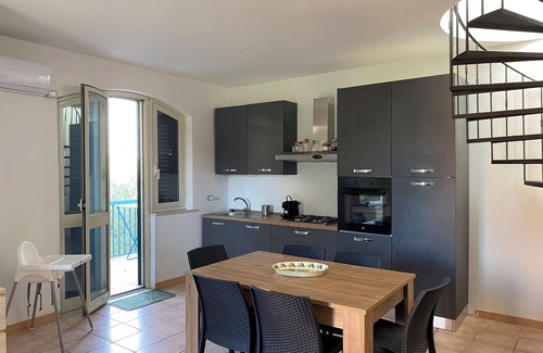 Eastern Sicily Apartamento | Apartment with terrace overlooking crystal clear sea. Parking space. Pets allowed