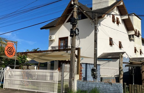 Barra de Ibiraquera Apartamento | Departamento con dos suites a dos cuadras del mar y tres cuadras de la laguna